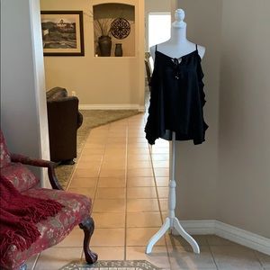Jennifer Lopez black long sleeve open shoulder top